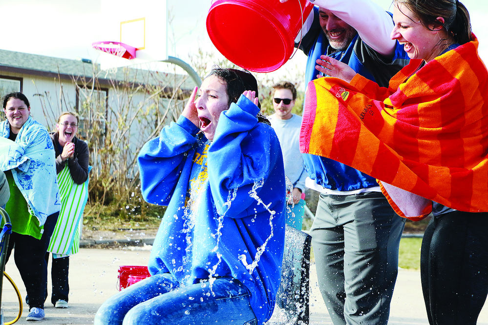Gering teachers get doused after challenge